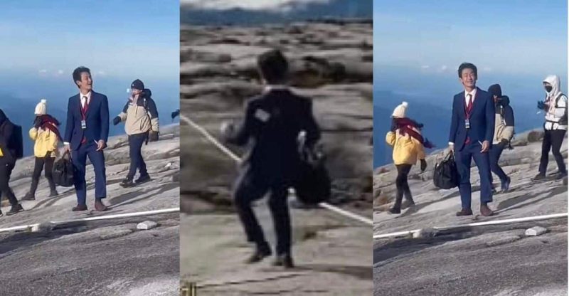 Pendaki Jepun curi perhatian, tawan Gunung Kinabalu dengan berpakaian pejabat