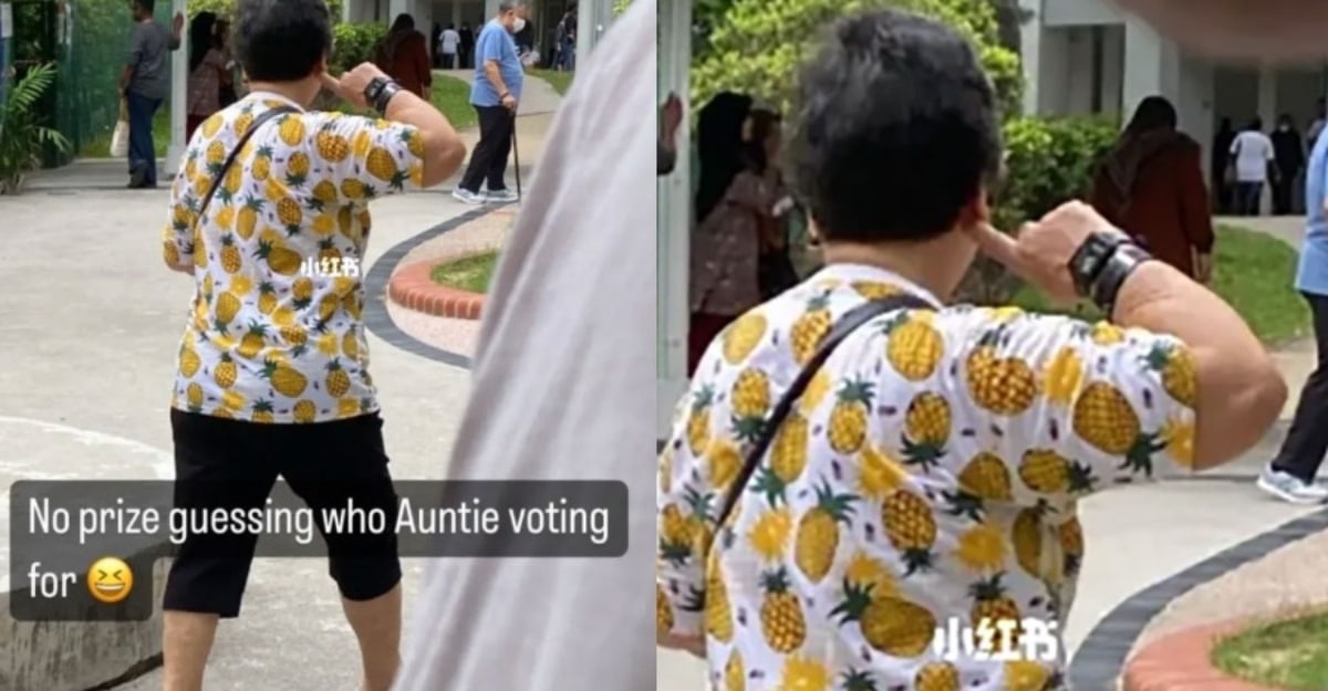 Wanita Singapura berbaju nanas semasa mengundi diarah pulang